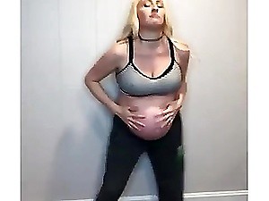 Big tit blonde preggo shows off